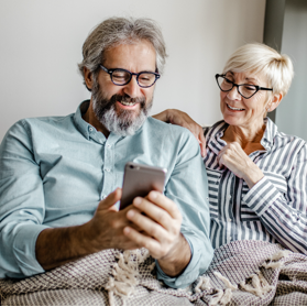 Couple viewing health data on phone Couple viewing health data on phone