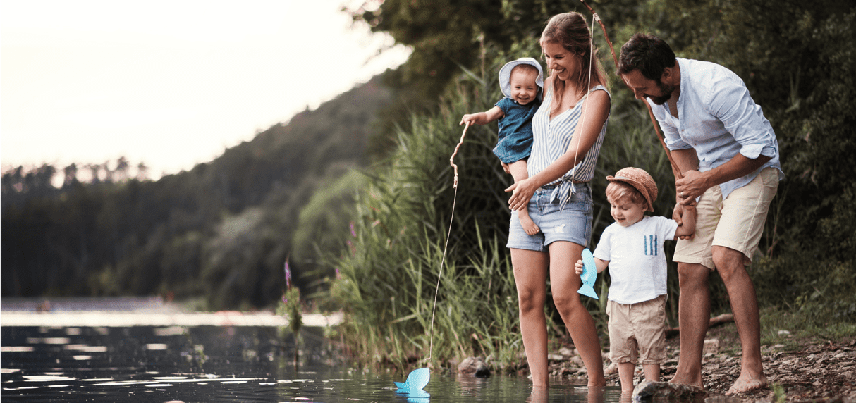 Parents fishing with baby and toddler