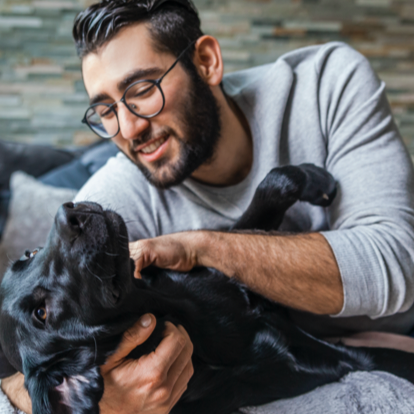 Man playing with dog Man playing with dog