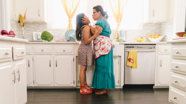 Mother and child in kitchen