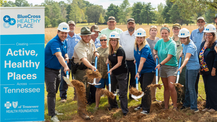 A group of people from blueCross employees to community members, breaking ground for a Healthy Place park.  A group of people from blueCross employees to community members, breaking ground for a Healthy Place park.